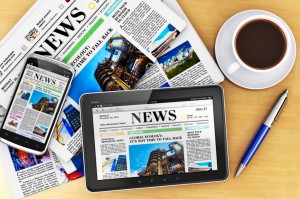 Tablet computer, smartphone and newspapers Inserzionisti pubblicitari