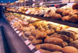 Bread on showcase in supermarket, close-up view