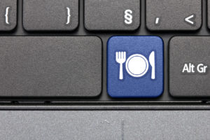 Restaurant. Blue hot key on computer keyboard.