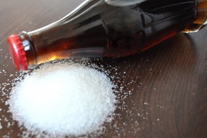 Bottle of coca-cola with sugar, soda with sugar, unhealthy