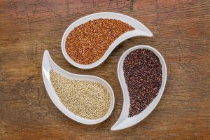 white, red and black quinoa grain